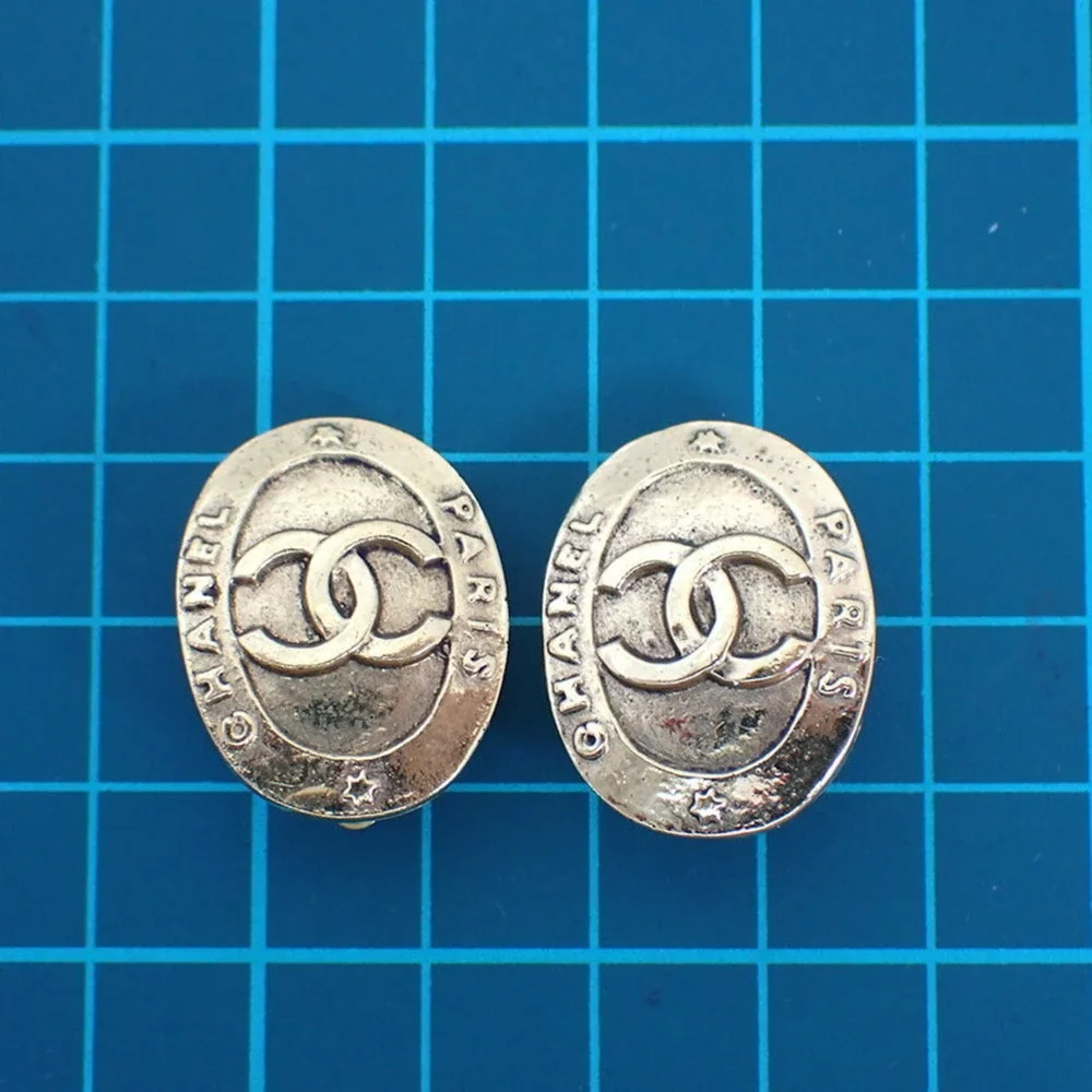 CHANEL Logo Earrings